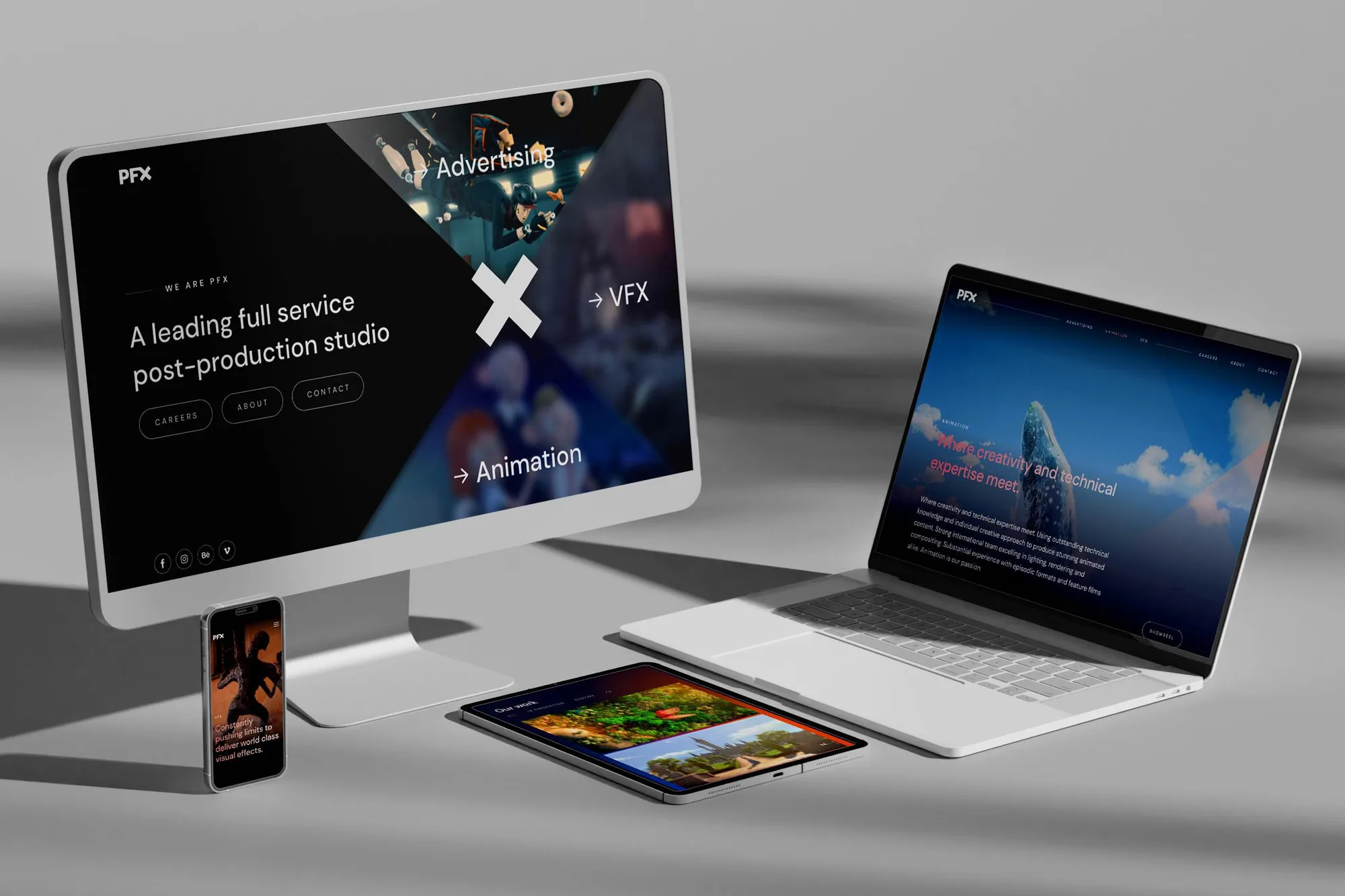 The PFX site shown across a desktop monitor, a laptop, a tablet and a phone, each on a different page of the site.