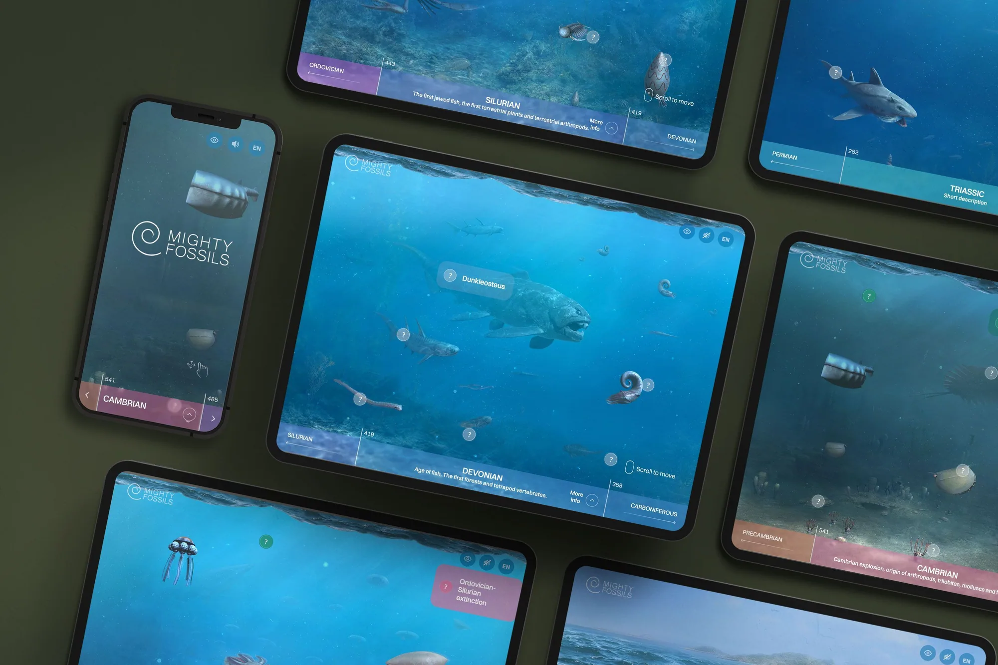 Tablets and a phone laid out on an olive surface, each showing a different geologic period of the Mighty Fossils timeline — a Devonian sea with a Dunkleosteus, a Silurian reef, a Triassic shark.